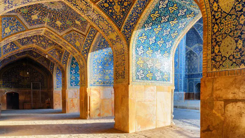 Beautiful vaulted arch passageway at the Shah Mosque in Isfahan